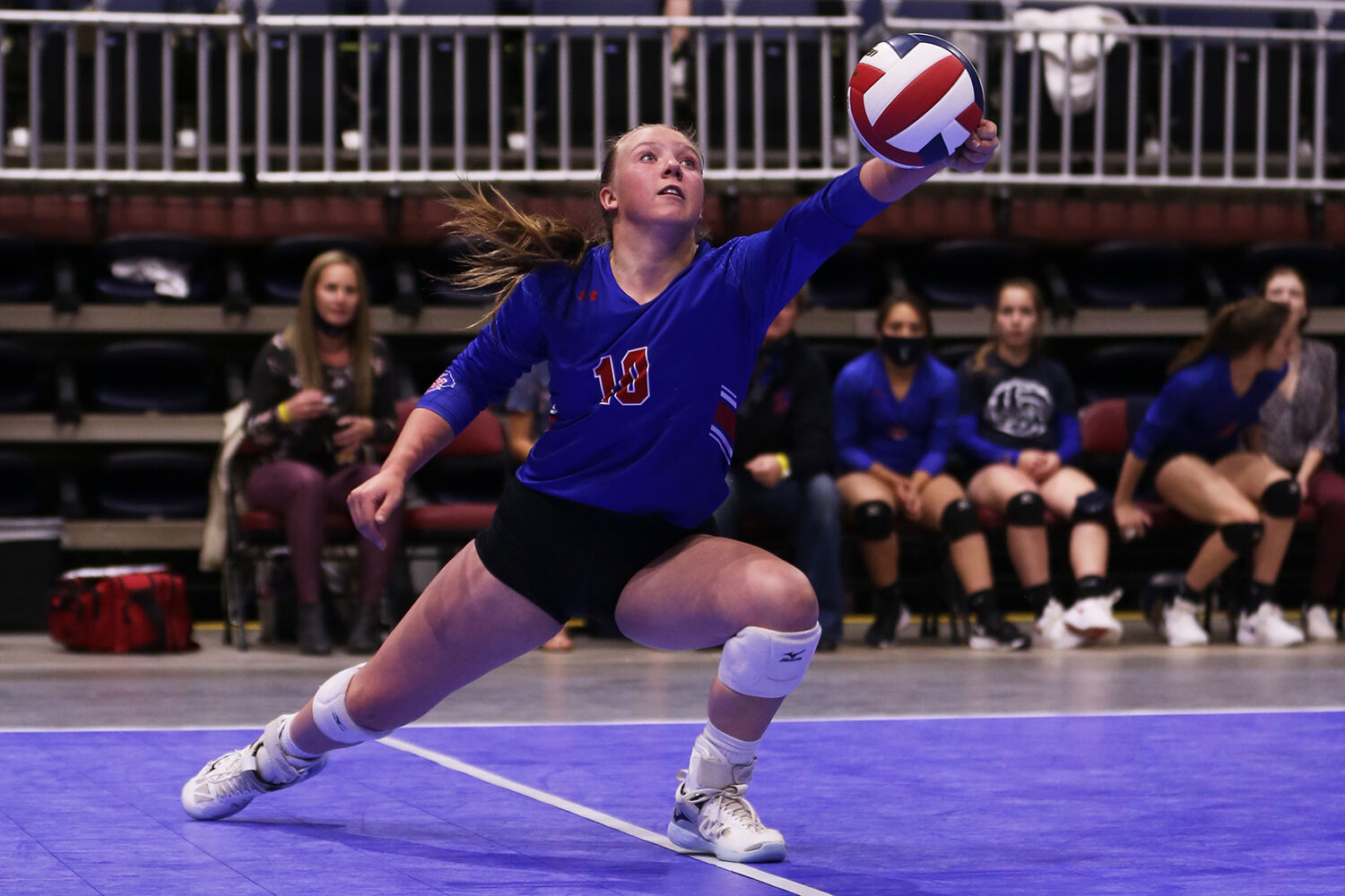 Kaycee High School sophomore Sierra Kilts lunges to save a ball